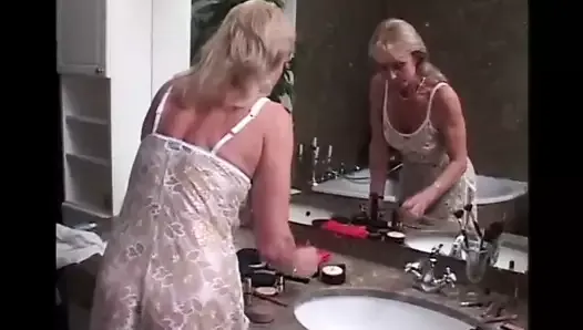 Blonde granny gets raunched anally by a big black chef.